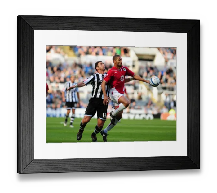 Framed Print : Powerful Duo: Khizanishvili and Saborio Unleashed - Newcastle Utd vs. Bristol City Framed Print : Powerful Duo: Khizanishvili and Saborio Unleashed - Newcastle Utd vs. Bristol City
