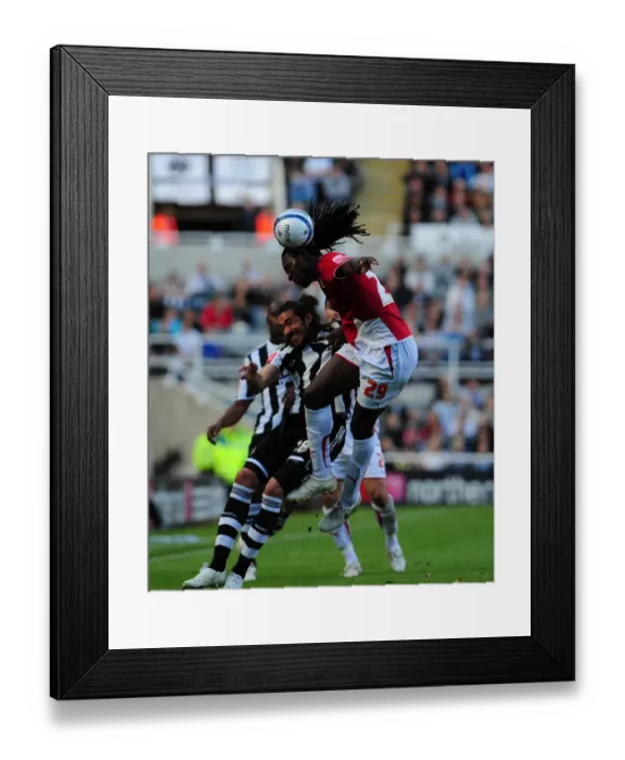 Framed Print : Evander Sno vs. Jonas Gutierrez: A Clash at St. James Park Framed Print : Evander Sno vs. Jonas Gutierrez: A Clash at St. James Park
