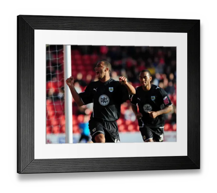 Framed Print : Nicky Maynard's Euphoric Goal Celebration: Opening the Scoring for Bristol City against Barnsley