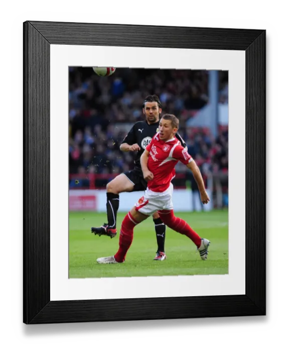Framed Print : Paul Hartley passes Radoslaw Majewski