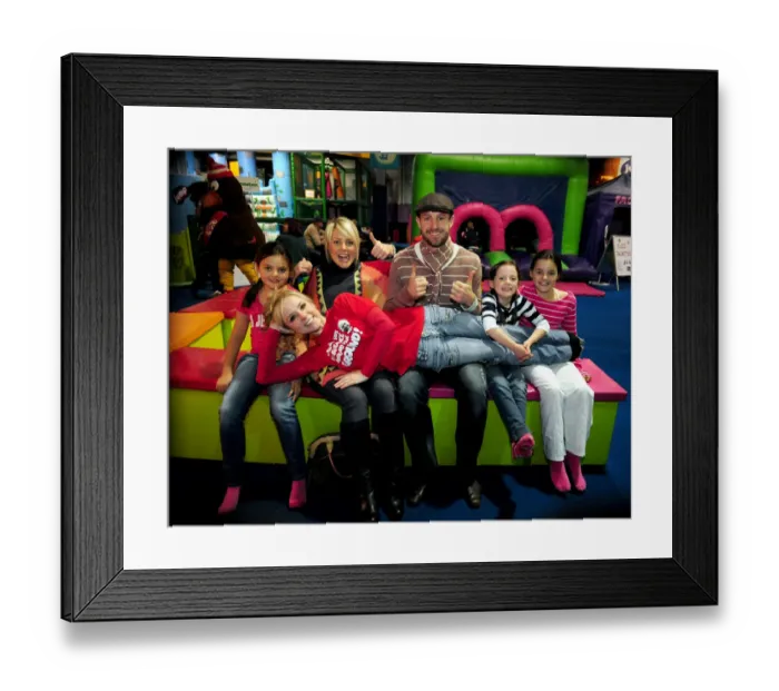 Framed Print : Bristol City First Team: Jumping into Christmas Joy at City Redz (09-10)