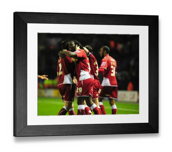 Framed Print : Evander Sno and team mates celebrate