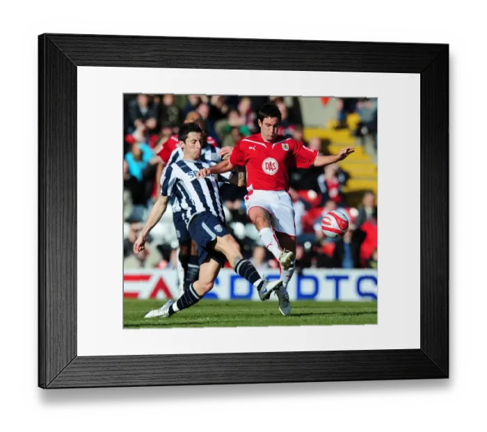 Framed Print : Battling for Supremacy: Johnson vs. Koren in the 2010 Bristol City vs. West Bromwich Albion Football Championship Clash