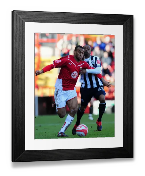 Framed Print : Bristol City's Marvin Elliott Fends Off Joss Labadie in Championship Clash vs. West Bromwich Albion (21 / 02 / 2010) Framed Print : Bristol City's Marvin Elliott Fends Off Joss Labadie in Championship Clash vs. West Bromwich Albion (21 / 02 / 2010)