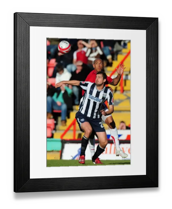 Framed Print : Battling for Supremacy: Iwelumo vs. Tamas in the Championship Clash between Bristol City and West Bromwich Albion (February 2010) Framed Print : Battling for Supremacy: Iwelumo vs. Tamas in the Championship Clash between Bristol City and West Bromwich Albion (February 2010)