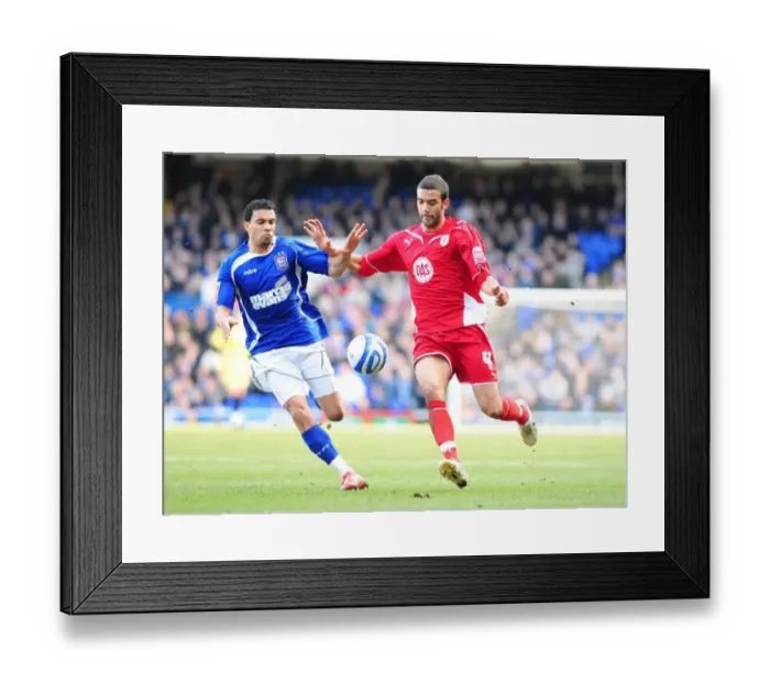 Framed Print : Bristol City vs Ipswich Town: A Football Rivalry - The Intense Clash Between Liam Fontaine and Carlos Edwards