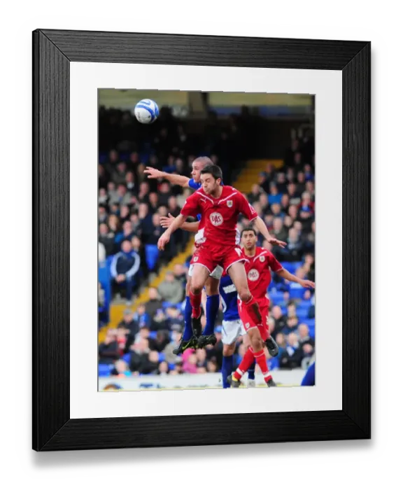 Framed Print : Cole Skuse wins the ball in the air Framed Print : Cole Skuse wins the ball in the air