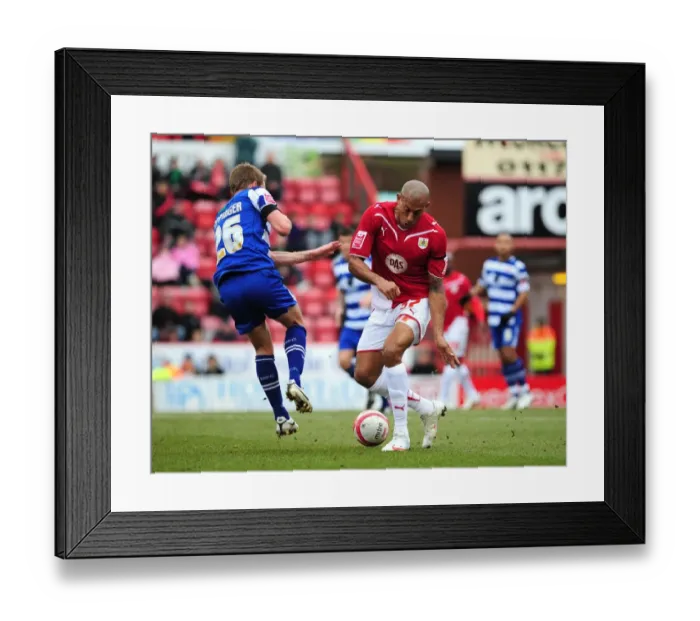 Framed Print : Chris Iwelumo battles with James Coppinger