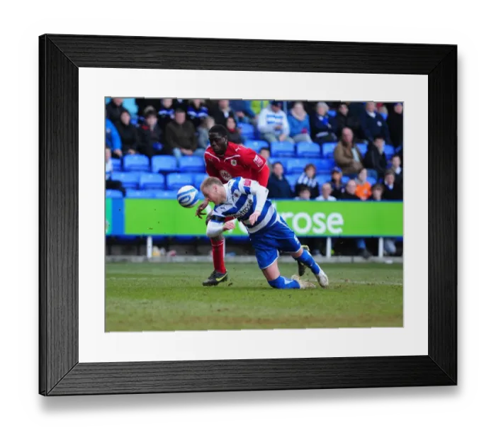 Framed Print : Matthew Mills Fouled by John Akinde: Reading vs. Bristol City Championship Clash, March 13, 2010