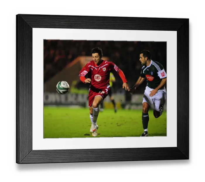 Framed Print : Championship Showdown: Sproule vs. Barker - Intense Rivalry: Bristol City vs. Plymouth Argyle (16 / 03 / 2010)