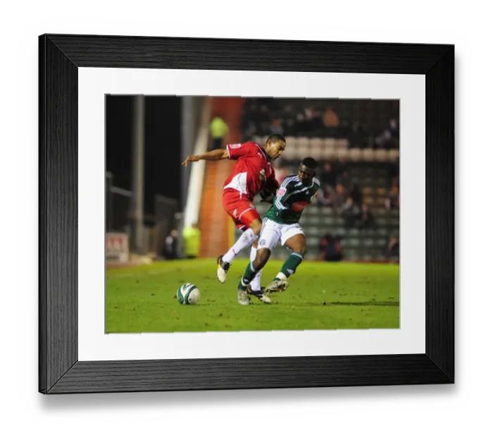 Framed Print : Intense Championship Showdown: Marvin Elliott vs. Yannick Bolasie, Bristol City vs. Plymouth Argyle (16 / 03 / 2010) Framed Print : Intense Championship Showdown: Marvin Elliott vs. Yannick Bolasie, Bristol City vs. Plymouth Argyle (16 / 03 / 2010)
