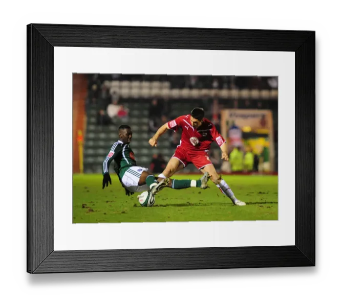 Framed Print : Intense Championship Showdown: Bradley Orr vs Yannick Bolasie, Plymouth Argyle vs Bristol City (16 / 03 / 2010) Framed Print : Intense Championship Showdown: Bradley Orr vs Yannick Bolasie, Plymouth Argyle vs Bristol City (16 / 03 / 2010)