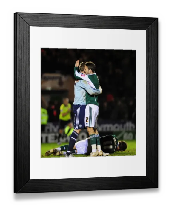 Framed Print : Bristol City's Championship Victory: Duguid and Stockdale's Jubilant Moment at Plymouth Argyle's Home Park Framed Print : Bristol City's Championship Victory: Duguid and Stockdale's Jubilant Moment at Plymouth Argyle's Home Park