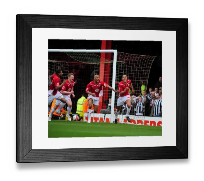 Framed Print : Thrilling Opener: Lewin Nyatanga Scores for Bristol City against Newcastle United in the Championship Clash at Ashton Gate Stadium (2010)