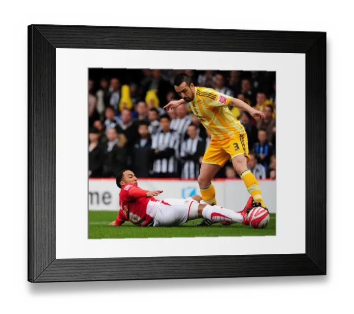 Framed Print : Bristol City's Nicky Maynard vs. Newcastle United's Jose Enrique - Intense Battle for the Ball (Championship 2010) Framed Print : Bristol City's Nicky Maynard vs. Newcastle United's Jose Enrique - Intense Battle for the Ball (Championship 2010)