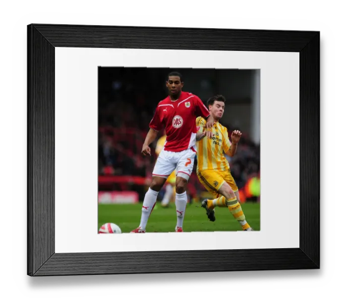 Framed Print : Battling for Supremacy: Marvin Elliott vs. Danny Guthrie in the 2010 Championship Clash between Bristol City and Newcastle United Framed Print : Battling for Supremacy: Marvin Elliott vs. Danny Guthrie in the 2010 Championship Clash between Bristol City and Newcastle United
