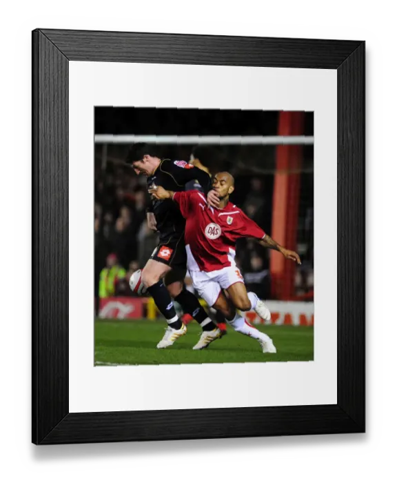 Framed Print : Battling for Supremacy: Haynes vs. Macken in the Championship Clash between Bristol City and Barnsley (23 / 03 / 2010) Framed Print : Battling for Supremacy: Haynes vs. Macken in the Championship Clash between Bristol City and Barnsley (23 / 03 / 2010)