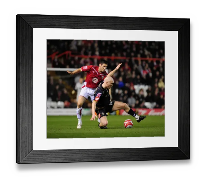 Framed Print : Bradley Orr vs. Emil Hallfredsson: Intense Battle for the Ball in Bristol City vs. Barnsley Championship Match, 2010 Framed Print : Bradley Orr vs. Emil Hallfredsson: Intense Battle for the Ball in Bristol City vs. Barnsley Championship Match, 2010