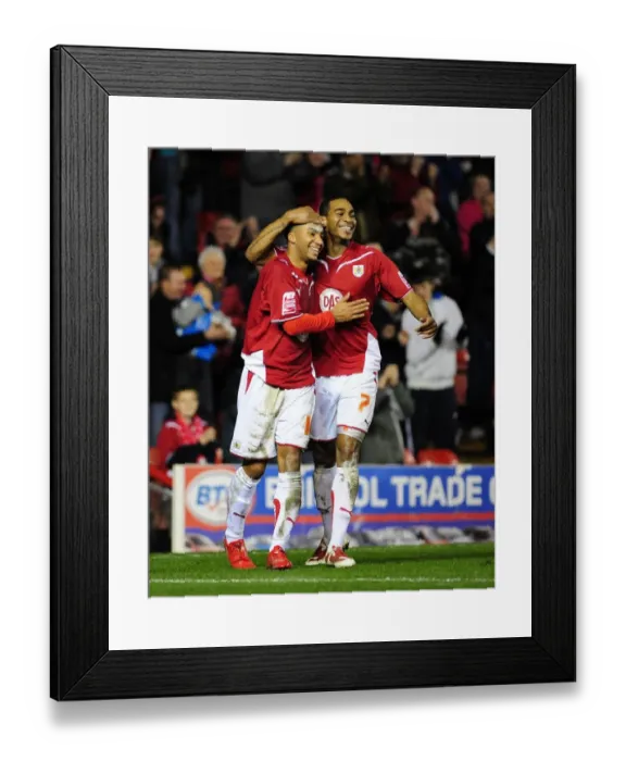 Framed Print : Bristol City's Nicky Maynard and Marvin Elliott Celebrate Goal in Championship Match against Barnsley (23 / 03 / 2010) Framed Print : Bristol City's Nicky Maynard and Marvin Elliott Celebrate Goal in Championship Match against Barnsley (23 / 03 / 2010)