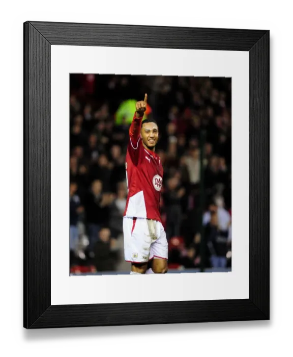 Framed Print : Nicky Maynard's Euphoric Goal Celebration: A Thrilling Moment in Bristol City's Championship Victory over Barnsley (2010) - Ashton Gate Stadium Framed Print : Nicky Maynard's Euphoric Goal Celebration: A Thrilling Moment in Bristol City's Championship Victory over Barnsley (2010) - Ashton Gate Stadium