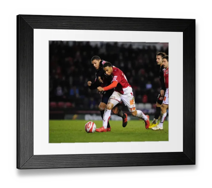 Framed Print : Bristol City's Nicky Maynard Fights for Possession Against Barnsley in Championship Match, 2010 Framed Print : Bristol City's Nicky Maynard Fights for Possession Against Barnsley in Championship Match, 2010