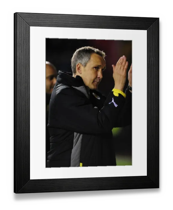 Framed Print : Bristol City's Keith Millen Leads the Charge Against Barnsley in Championship Clash at Ashton Gate, 2010