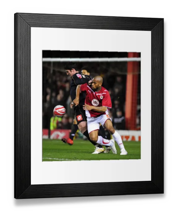 Framed Print : Intense Championship Clash: Haynes vs Macken Battle for Ball Supremacy - Bristol City vs Barnsley, 23rd March 2010 Framed Print : Intense Championship Clash: Haynes vs Macken Battle for Ball Supremacy - Bristol City vs Barnsley, 23rd March 2010