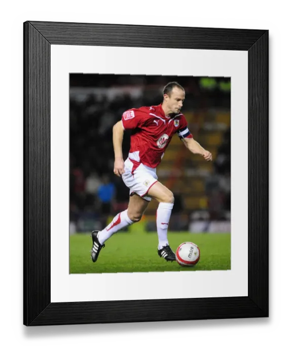 Framed Print : Bristol City Captain Louis Carey Leads the Charge Against Barnsley in Championship Clash at Ashton Gate, 2010