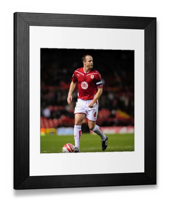 Framed Print : Bristol City's Louis Carey Rallies Team Against Barnsley in 2010 Championship Showdown at Ashton Gate Framed Print : Bristol City's Louis Carey Rallies Team Against Barnsley in 2010 Championship Showdown at Ashton Gate