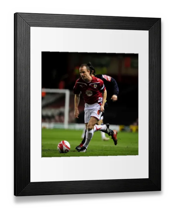 Framed Print : Bristol City's Louis Carey Rallies Team in 2010 Championship Showdown Against Barnsley at Ashton Gate