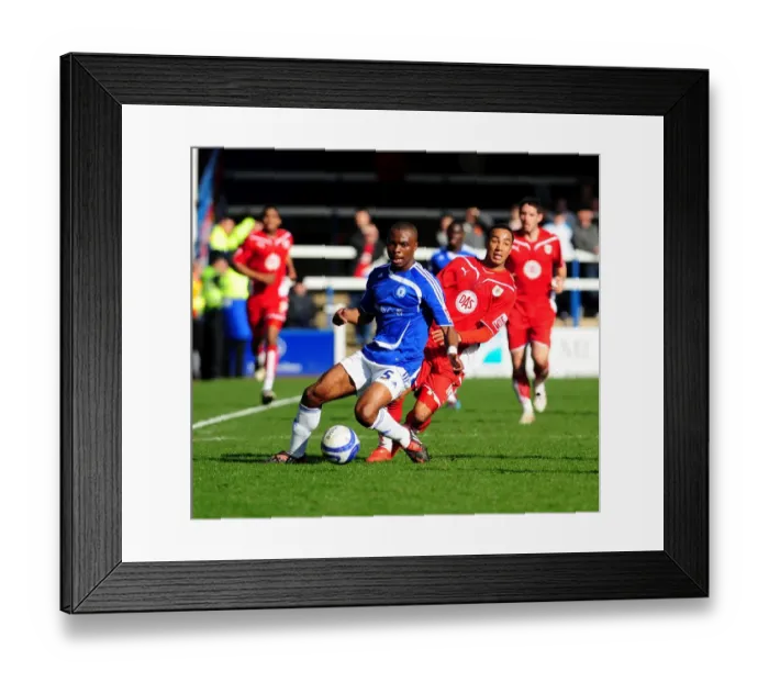 Framed Print : Nicky Maynard vs Gabriel Zakuani: Intense Battle for the Ball in Peterborough v Bristol City Championship Clash, March 2010