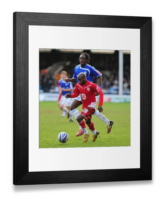 Framed Print : Battling for Control: Jamal Campbell-Ryce vs. Exodus Geohaghon in the Intense Championship Clash between Peterborough and Bristol City, 2010 Framed Print : Battling for Control: Jamal Campbell-Ryce vs. Exodus Geohaghon in the Intense Championship Clash between Peterborough and Bristol City, 2010