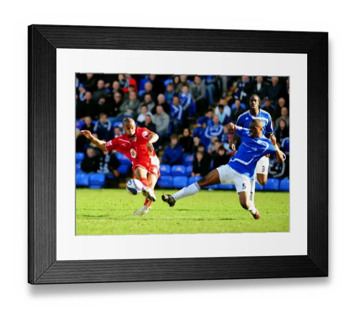 Framed Print : Blocked Shot: Peterborough's Zakuani Denies Haynes at London Road (Peterborough v Bristol City, Championship) Framed Print : Blocked Shot: Peterborough's Zakuani Denies Haynes at London Road (Peterborough v Bristol City, Championship)
