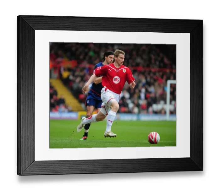 Framed Print : Chasing the Win: Christian Ribeiro vs. George Boyd in the 2010 Championship Clash between Bristol City and Nottingham Forest Framed Print : Chasing the Win: Christian Ribeiro vs. George Boyd in the 2010 Championship Clash between Bristol City and Nottingham Forest