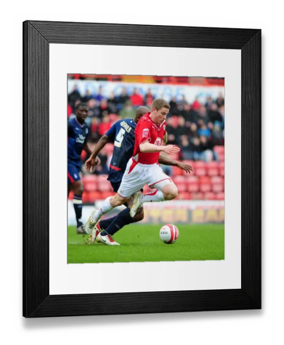 Framed Print : Intense Rivalry: Christian Ribeiro vs. Dele Adebola Battle in the Championship Clash, April 2010 (Bristol City vs. Nottingham Forest) Framed Print : Intense Rivalry: Christian Ribeiro vs. Dele Adebola Battle in the Championship Clash, April 2010 (Bristol City vs. Nottingham Forest)