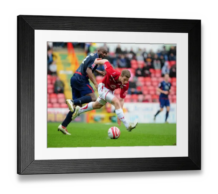 Framed Print : Intense Rivalry: A Battle of Wits - Ribeiro vs. Adebola in the Championship Clash between Bristol City and Nottingham Forest, April 2010 Framed Print : Intense Rivalry: A Battle of Wits - Ribeiro vs. Adebola in the Championship Clash between Bristol City and Nottingham Forest, April 2010
