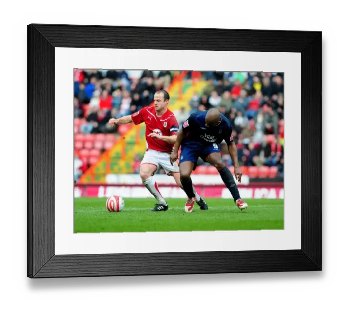 Framed Print : A Battle for the Ball: Bristol City vs. Nottingham Forest - Championship Clash, 03 / 04 / 2010 Framed Print : A Battle for the Ball: Bristol City vs. Nottingham Forest - Championship Clash, 03 / 04 / 2010