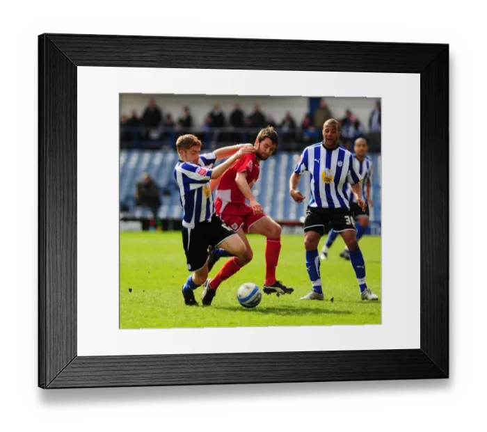 Framed Print : Battling for Control: Skuse vs. O'Connor in the Intense Championship Clash between Sheffield Wednesday and Bristol City (16th March 2010)