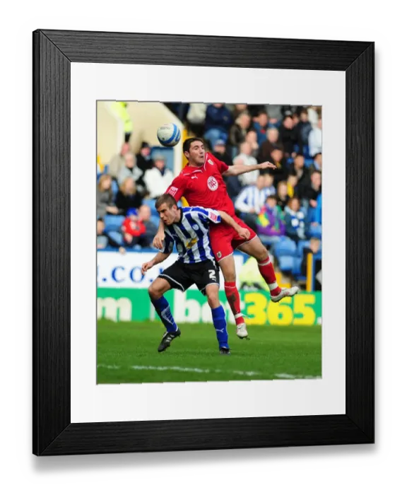 Framed Print : Bradley Orr vs. Tommy Spurr: Aerial Battle in the Championship Clash between Sheffield Wednesday and Bristol City (16th March 2010)