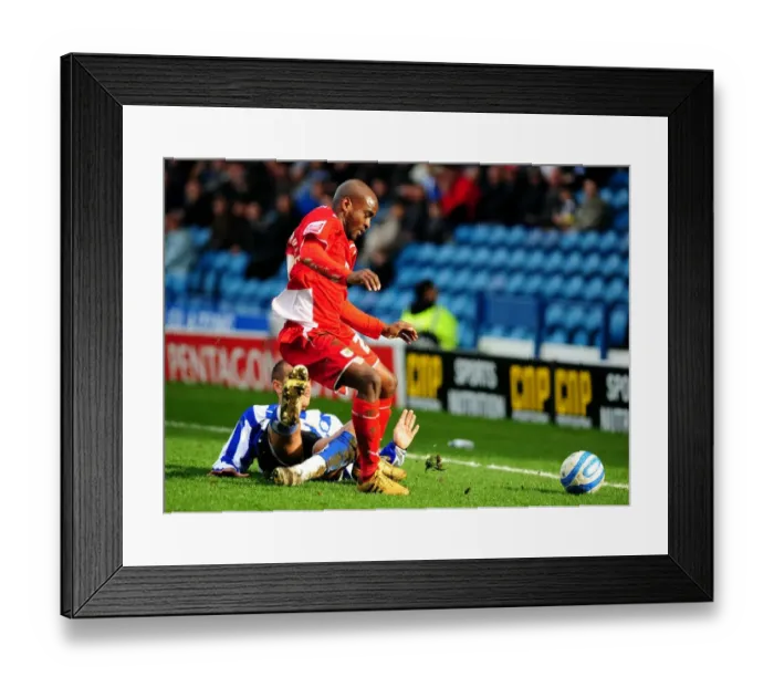 Framed Print : Clash at Hillsborough: Leon Clarke Stops Jamal Campbell-Ryce's Charge - Championship Showdown between Sheffield Wednesday and Bristol City (05 / 04 / 2010) Framed Print : Clash at Hillsborough: Leon Clarke Stops Jamal Campbell-Ryce's Charge - Championship Showdown between Sheffield Wednesday and Bristol City (05 / 04 / 2010)