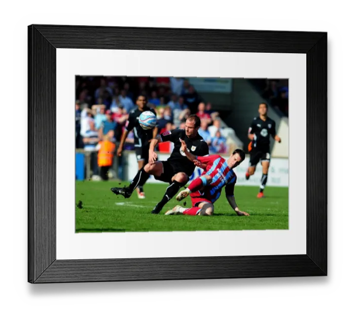 Framed Print : Bristol City's Louis Carey Clashes with Cliff Byrne of Scunthorpe United in Championship Battle, 17th April 2010