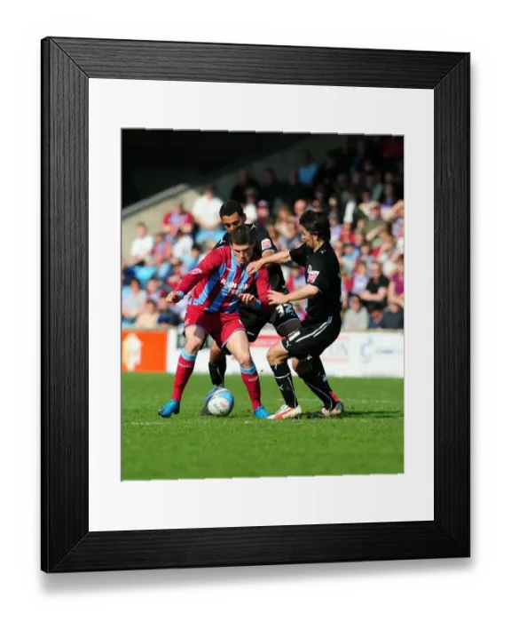 Framed Print : Battle for the Ball: Hartley, Nyatanga, and Sparrow Clash in Scunthorpe vs. Bristol City Championship Match, 17 / 04 / 2010 Framed Print : Battle for the Ball: Hartley, Nyatanga, and Sparrow Clash in Scunthorpe vs. Bristol City Championship Match, 17 / 04 / 2010