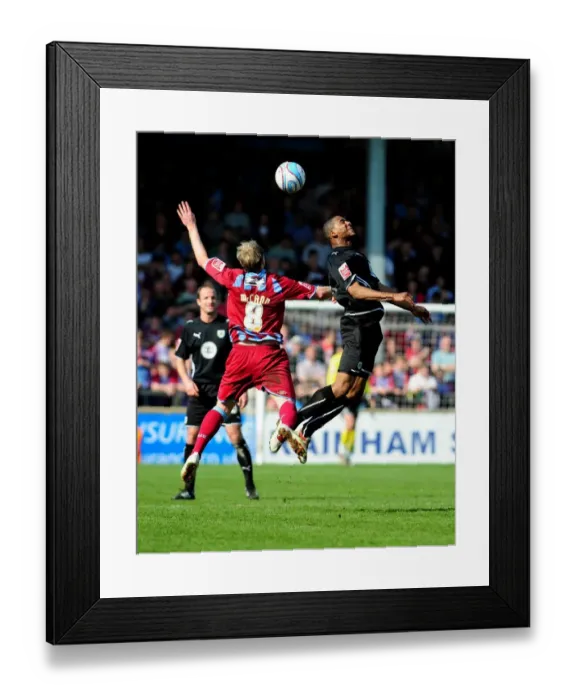 Framed Print : Clash in the Championship: Aerial Battle - Marvin Elliott vs Grant McCann (17-04-2010) Framed Print : Clash in the Championship: Aerial Battle - Marvin Elliott vs Grant McCann (17-04-2010)