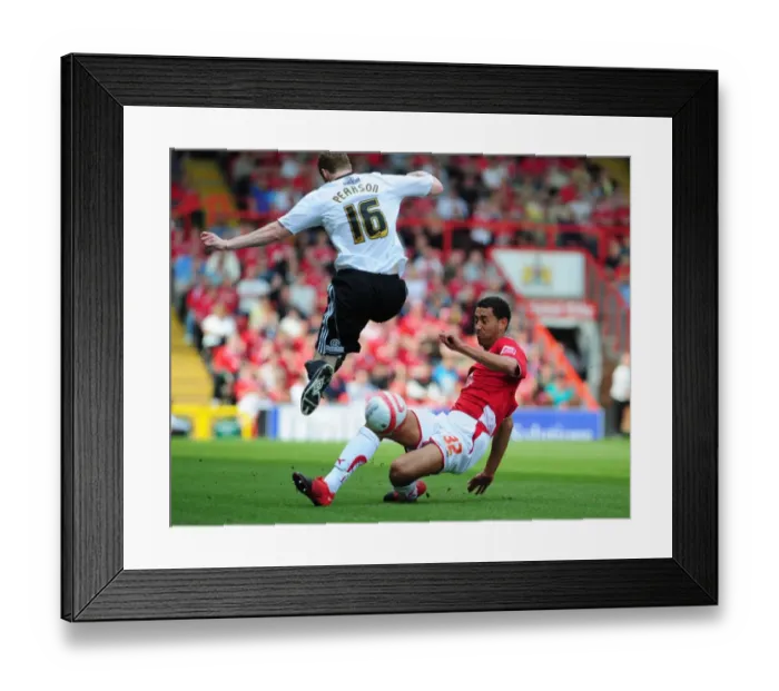 Framed Print : Derby County's Stephen Pearson Tackled by Lewin Nyatanga of Bristol City - Championship Clash, April 2010 Framed Print : Derby County's Stephen Pearson Tackled by Lewin Nyatanga of Bristol City - Championship Clash, April 2010