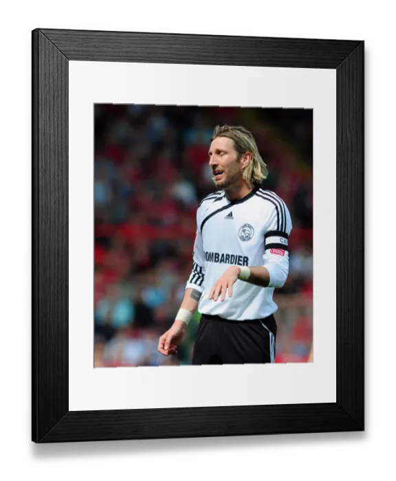 Framed Print : Robbie Savage Leads Derby in Championship Battle at Ashton Gate against Bristol City, 2010 Framed Print : Robbie Savage Leads Derby in Championship Battle at Ashton Gate against Bristol City, 2010
