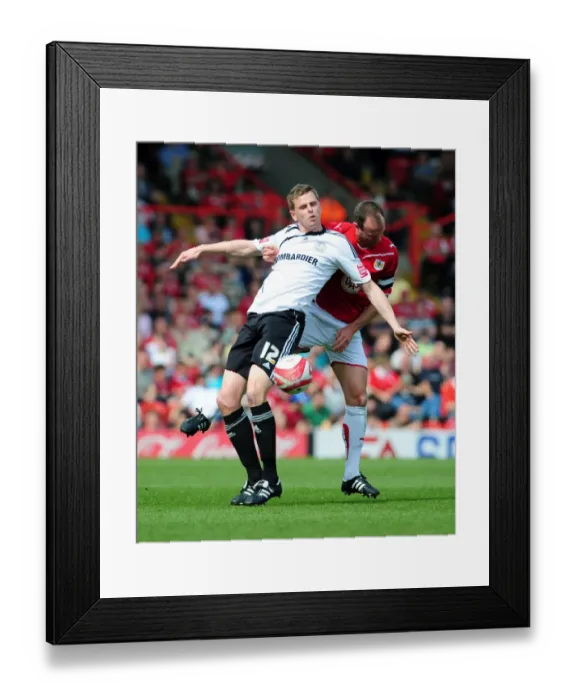 Framed Print : Bristol City vs Derby County: A Battle for Supremacy - Louis Carey vs Stephen Pearson, Championship Match, 24 / 04 / 2010 Framed Print : Bristol City vs Derby County: A Battle for Supremacy - Louis Carey vs Stephen Pearson, Championship Match, 24 / 04 / 2010