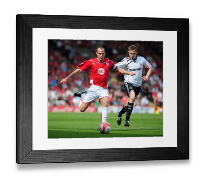 Framed Print : Battling for Championship Supremacy: Louis Carey vs Chris Porter, April 2010 - A Football Rivalry at Ashton Gate