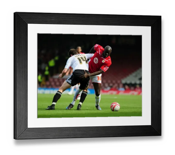 Framed Print : Battling for Supremacy: Agyemang vs Barker in the 2010 Championship Clash between Bristol City and Derby County Framed Print : Battling for Supremacy: Agyemang vs Barker in the 2010 Championship Clash between Bristol City and Derby County