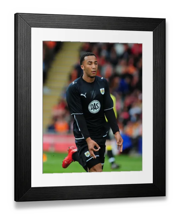 Framed Print : Thrilling Nicky Maynard Goal Celebration: Championship Showdown between Blackpool and Bristol City (2010)