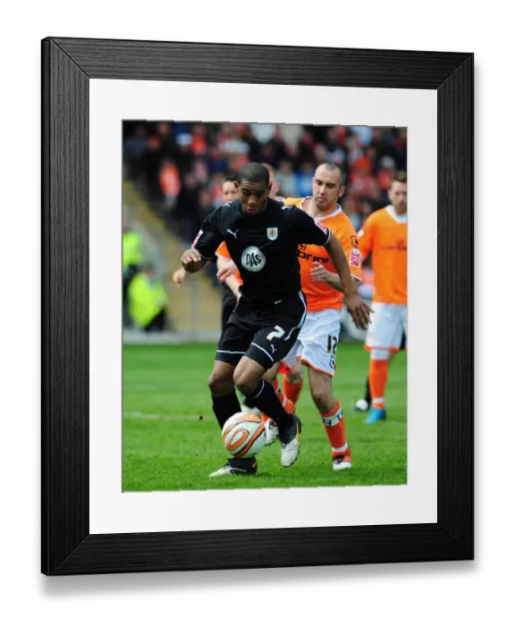 Framed Print : Battling for Supremacy: Marvin Elliott vs. Gary Taylor-Fletcher in the 2010 Championship Clash between Blackpool and Bristol City